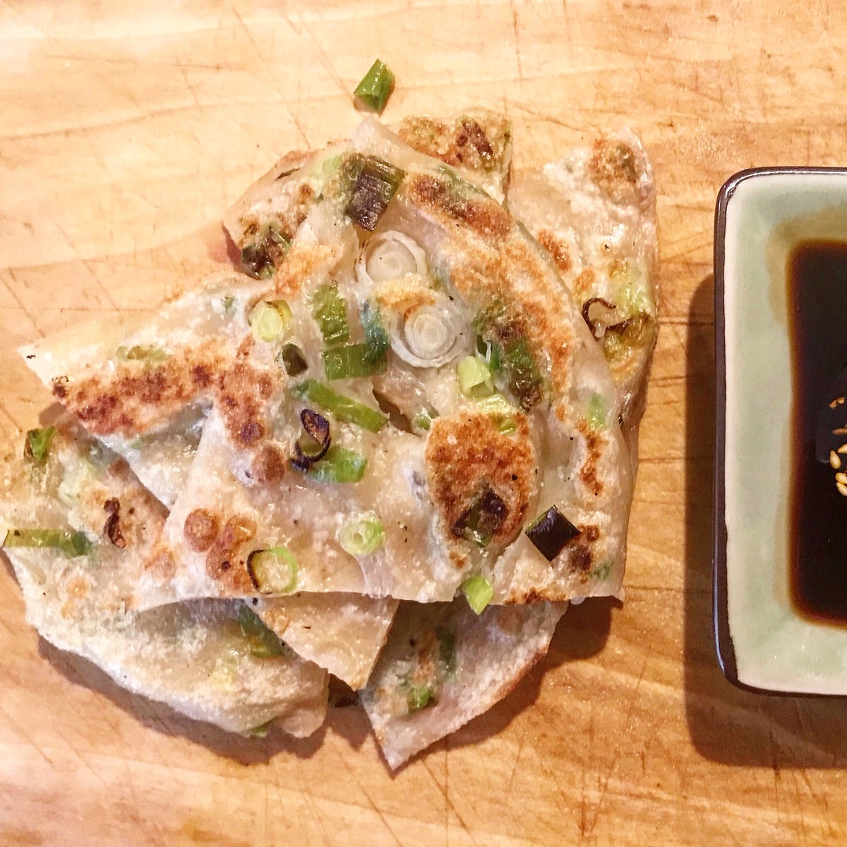 This recipe for scallion pancakes involves a little advance planning, but the flakey, crispy, chewy, oniony result is well worth the effort.